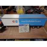 A North American trailer car together with a boxed Tamiya tractor truck electrical unit set