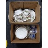Two boxes of English gold rimmed bone china tea and dinner ware,