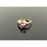 A 10ct gold diamond and pink topaz ring,