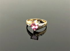 A 10ct gold diamond and pink topaz ring,