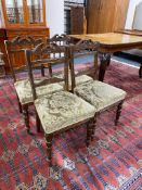 A set of four Edwardian dining chairs