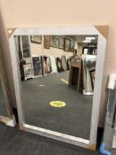 A glitter framed mirror