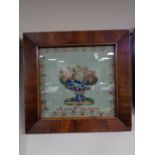 A Victorian mahogany framed needlework - flowers in a bowl by Ann Nicholson