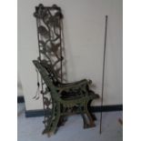 Two pairs of cast iron bench ends together with a cast iron bench back panel