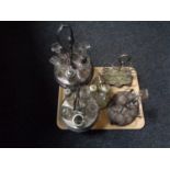 A tray of five antique plated cruet stands and assorted cruet bottles