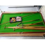 A 6' slate bed table topped snooker table with accessories, cues,