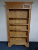 A set of pine open bookshelves