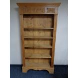 A set of pine open bookshelves