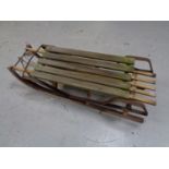 Two vintage wooden sledges