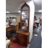 An antique mahogany hall cabinet fitted with a drawer with hall mirror