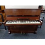 A mahogany cased overstrung piano by Hindsberd