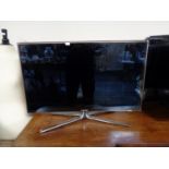 A Samsung 32" LCD TV with remote (no lead)