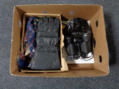 A box of Tasco binoculars, vintage leather cap,