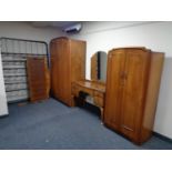 A four piece walnut Queen Anne style bedroom suite - lady's and gent's wardrobe,