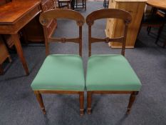 A pair of continental mahogany dining chairs