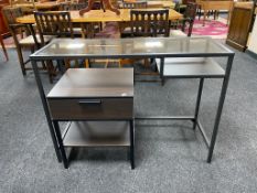 A contemporary metal framed glass topped dressing table together with similar bedside stand