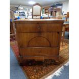 An antique mahogany three drawer chest