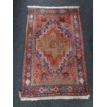 A Persian rug,