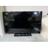 A Philips 40" LCD TV with remote (continental wiring)