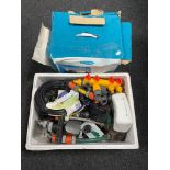 A boxed shower force pump together with a further box of hose pipe attachments,