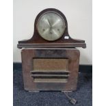 A walnut cased HMV radio together with an oak mantel clock with silvered dial