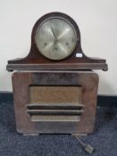 A walnut cased HMV radio together with an oak mantel clock with silvered dial