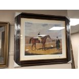 A contemporary framed equestrian print