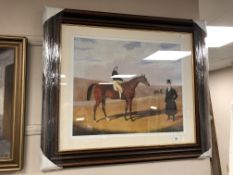 A contemporary framed equestrian print