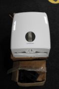 Two boxed Kimberley Clarke hand towel dispensers and a box of loft legs