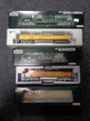 Three boxed Kato HO scale trains