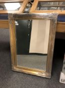 An antique style gilt mirror