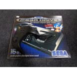 A boxed Sega Megadrive console together with additional Maxfire joy pad