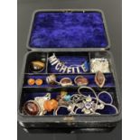 A Victorian jewellery box containing amber and silver jewellery; pendant on chain,