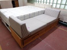 A day bed fitted with two drawers