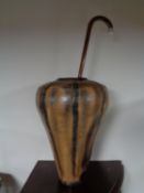 A contemporary metal vase together with a walking stick with silver handle