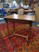 An early twentieth century mahogany occasional table