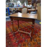 An early twentieth century mahogany occasional table