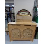 A set of pine shelves together with a radiator cover and box of assorted pictures,