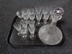 A tray of crystal ship's decanter and three sets of crystal liqueur and wine glasses