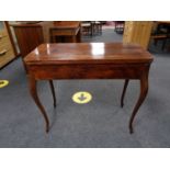 A late nineteenth century mahogany turn over top tea table on cabriole legs