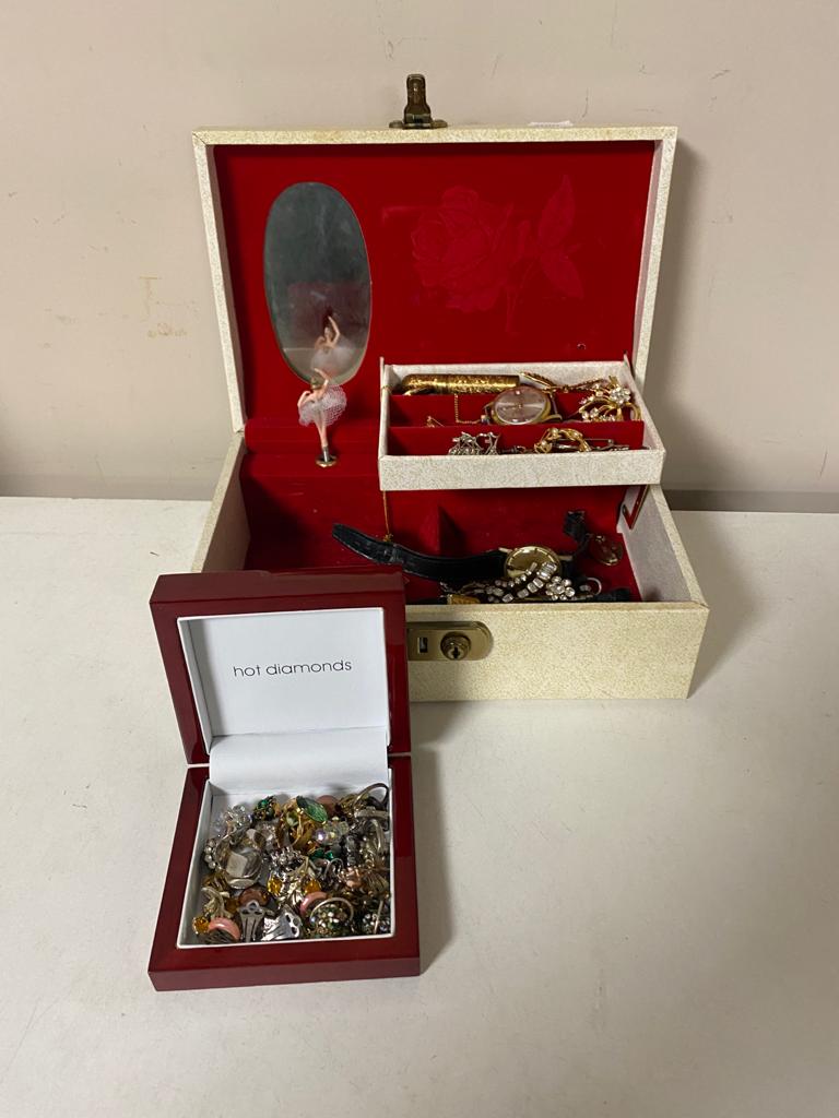 A musical jewellery box of assorted costume jewellery, Gent's Lamar watch face,