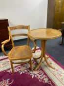 An early twentieth century bentwood occasional table on four way pedestal together with matching