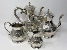An ornate silver plated four piece tea service