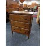 A mid century pine three drawer chest