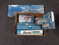 A box of seven boxed Revell modelling kits of boats