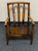 A twentieth century stained beech chair