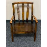 A twentieth century stained beech chair