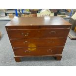 A Victorian mahogany three drawer chest on bracket feet