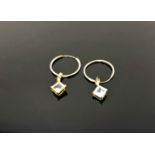 A pair of gold aquamarine earrings