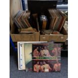 Two boxes of vinyl LP's and 45's,